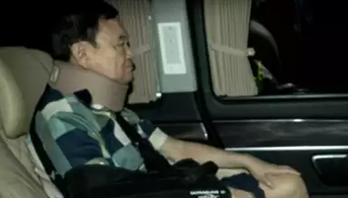 Thailands former prime minister Thaksin Shinawatra arrives at his family compound. — AFP/File