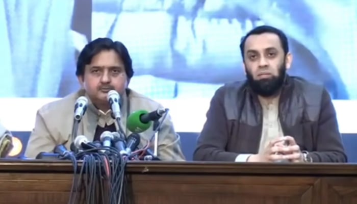 PMLN Leaders Malik Ahmed Khan and  Atta Tarar Addressing a joint press conference on February 18, 2024. — Facebook/PML(N)