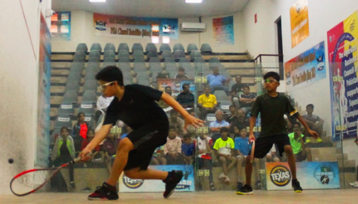 Junior players can be seen during a squash match. — Facebook/Sindh Squash Association (SSA)