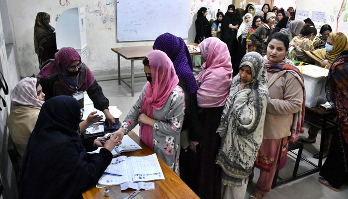 A large number of women in queue to cast their vote at a polling station during the General Election 2024 on February 8, 2024. — APP