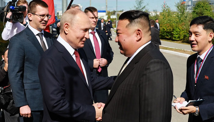 Russian leader Vladimir Putin (left) shakes hands with his North Korean counterpart, Kim Jong-un during their meeting at the Vostochny Cosmodrome in the Amur region. — AFP/File
