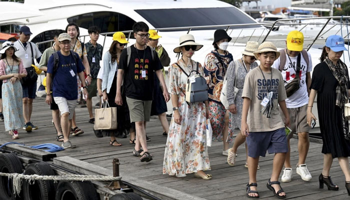 国内边境重新开放后，中国游客已返回印度尼西亚度假胜地巴厘岛。  ——法新社/文件