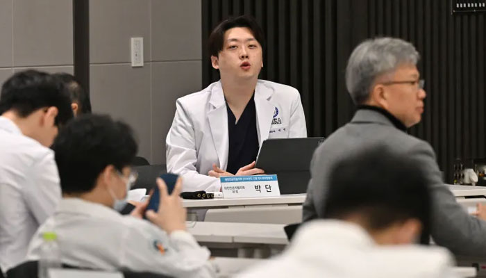 Park Dan, center, head of the Korea Interns and Residents Association, speaks at an emergency meeting with trainee doctors at the Korean Medical Association, Seoul, South Korea, on February 20, 2024. — AFP