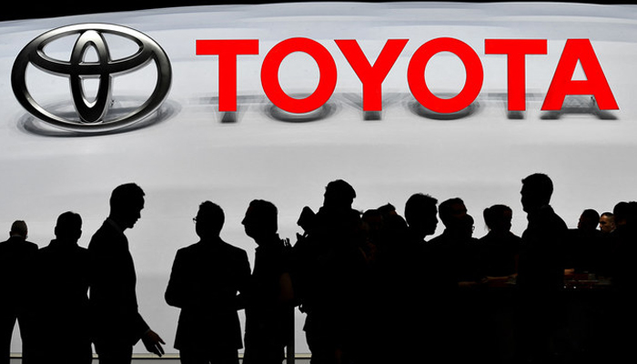 Visitors are gathering on the stand of Japanese carmaker Toyota during the first press day of the Geneva International Motor Show. — AFP/File