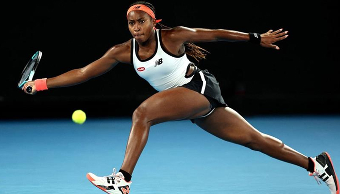 Coco Gauff of the US hits a return against Britains Emma Raducanu during their womens singles match in Melbourne. — AFP/File
