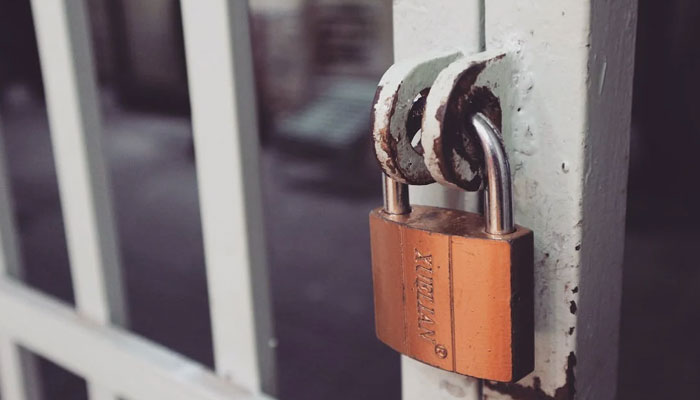 This representational images shows lock on the gate. — Pexels