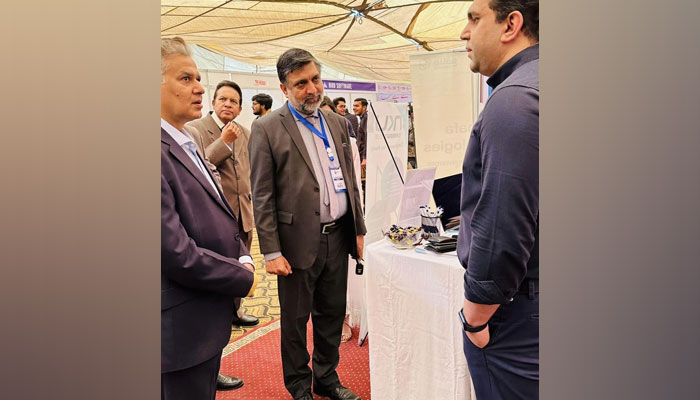 UET Vice-Chancellor Prof Dr Nasir Hayat (L) visits the stall of company/ Industry along with Convener Career Fair Prof Dr Naveed Ramzan (C) on February 22, 2024. — Facebook/Naeem Ahmad