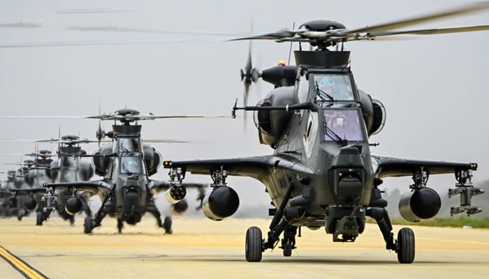 This image shows the Chinese militarys WZ-10 attack helicopters during a flight training exercise on May 10, 2022. — China Military via Global Times