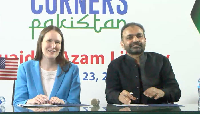 In this photo, US Consul General Lahore Kirsten Hawkins signs the MoU with Director General Punjab Public Libraries Kashif Manzoor for the new Lincoln Corner at the Quaid-e-Azam Library on February 23, 2024. — APP