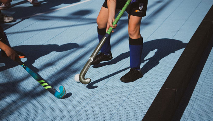 A representational image of players during a hockey match. — Unsplash