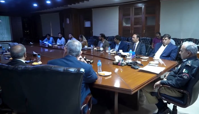 Karachi Police Chief Khadim Hussain Rind chairs a meeting regarding the Sindh Safe City Project in this still in Karachi on February 23, 2024. — Facebook/Karachi Police - KPO
