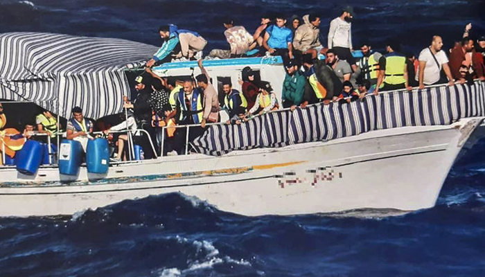 Migrants on a boat during a search and rescue operation off Karpathos island. — AFP/File