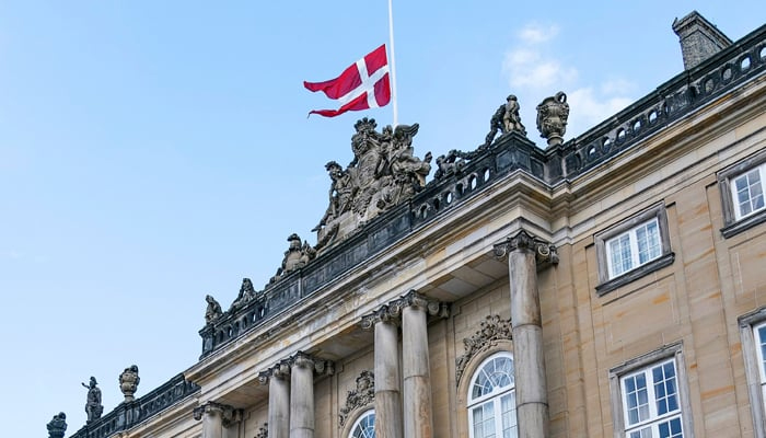 The Danish national flag flies at half-mast at Amalienborg Palace in Copenhagen, Denmark. — AFP/File