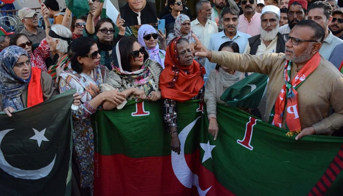 Leaders and supporters of Tehreek-e-Insaf (PTI) hold a protest demonstration against alleged rigging in General Election 2024, held outside Provincial Election Commission Office in Karachi on February 17, 2024. — PPI