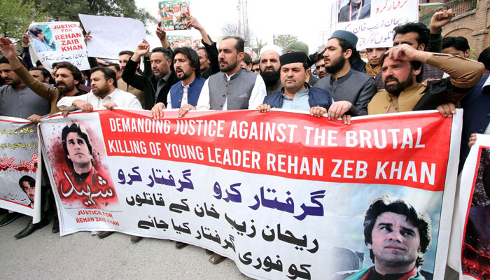 Residents of Bajaur hold protest demonstration for demanding justice against the brutal killing of young leader Rehan Zeb Khan, at Peshawar press club on February 25, 2024. — PPI