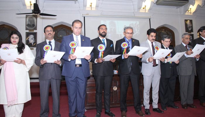 Newly-elected members takes oath during oath-taking ceremony of office-bearers of the Society of Surgeons Pakistan Lahore was organized at King Edward Medical University Lahore on February 25, 2024. — Facebook/King Edward Medical University Lahore