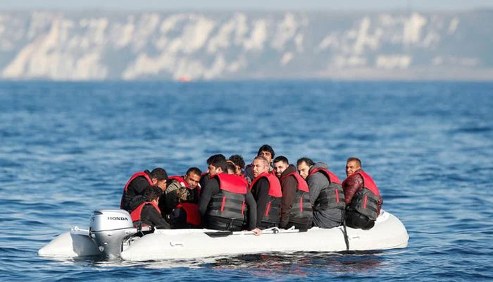 This image shows migrants crossing the UK channel in a boat. — AFP/File