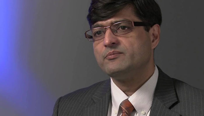 Screenshot of Deputy Governor State Bank Dr Inayat Hussain. — YouTube/CG AP