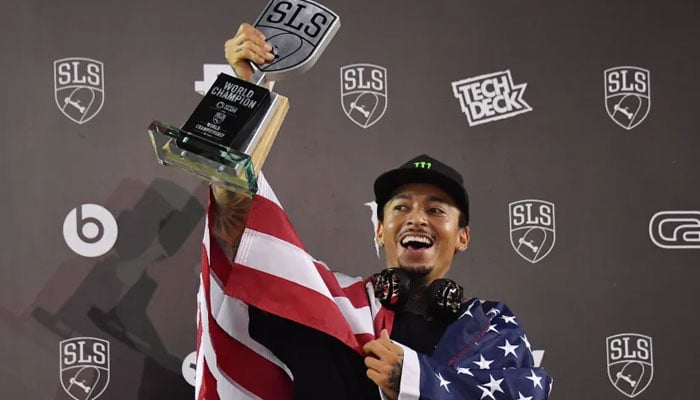 US skateboarder Nyjah Huston celebrates with the trophy after winning the Street League Skateboarding World Championship men’s final in Sao Paulo, Brazil on September. 22, 2019. — AFP