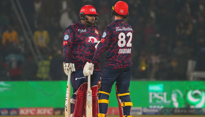 Wicket-keeper Batter Azam Khan (L) can be seen with batter Munro during the match. — Facebook/ Islamabad United