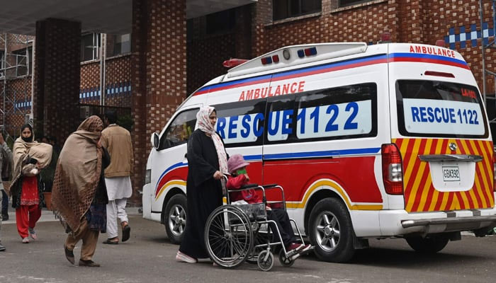 Rescue 1122 stands outside the hospital on January 31, 2024. — AFP