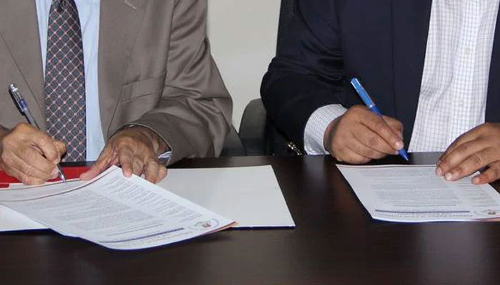 This representational image shows officials signs a MOU during signing ceremony. — APPNA Website