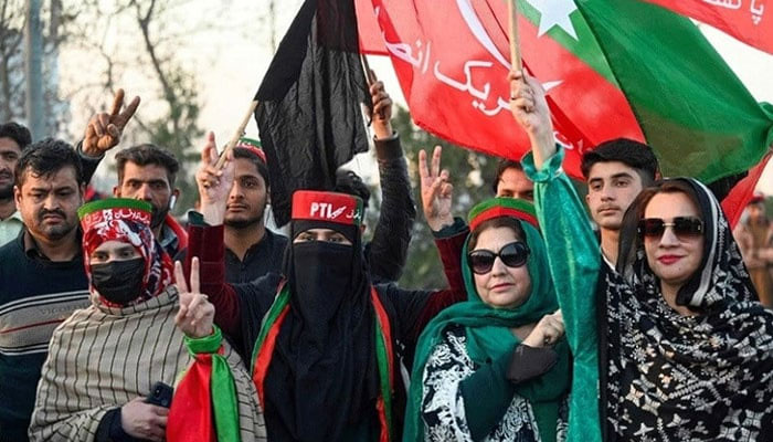 PTI supporters can be seen during the protest in Peshawar on February 12, 2024. — AFP