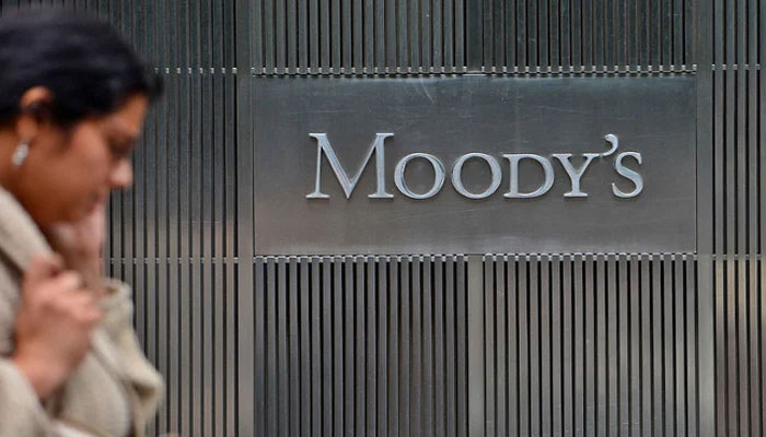 A sign for Moodys rating agency is displayed at the company headquarters in New York, US. — AFP/File