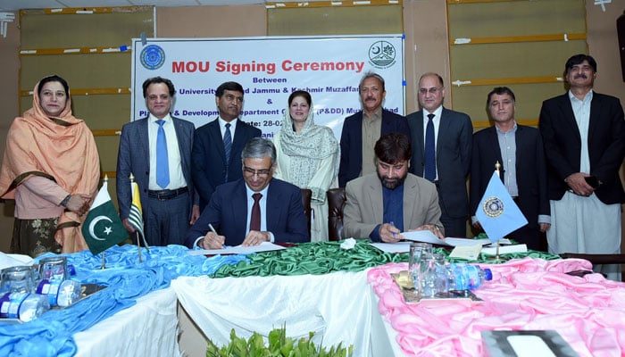 Officials sign MOU during a signing ceremony between the University of Azad Jammu and Kashmir (UAJK) and the Planning and Development (P&D) Department of the Government of Azad Jammu and Kashmir (GoAJK)  at the City Campus of the university on February 28, 2024. — Facebook/The University of Azad Jammu and Kashmir - UAJK