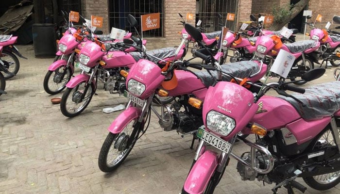This image shows pink motorbikes park in parking on December 18, 2018. — Facebook/Developing Pakistan