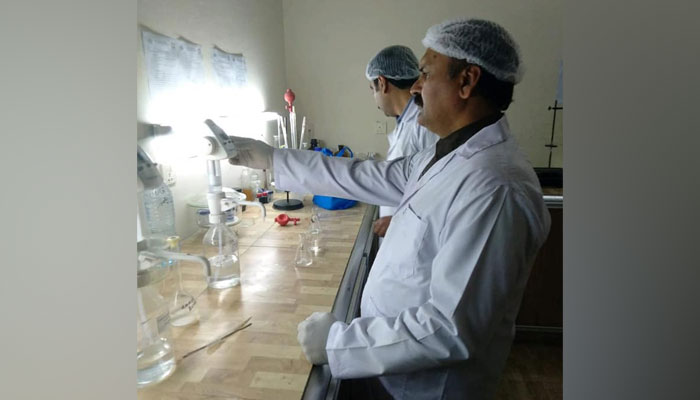 This image released on January 16, 2020 shows experts test a water in lab. — Facebook/Water Testing Laboratory WASA GRW