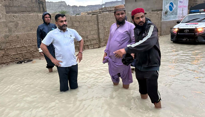 Police and Rescue officials are busy in relief and rescue efforts to help people affected by flood due to heavy downpour of winter season, in Gwadar on February 28, 2024. — PPI