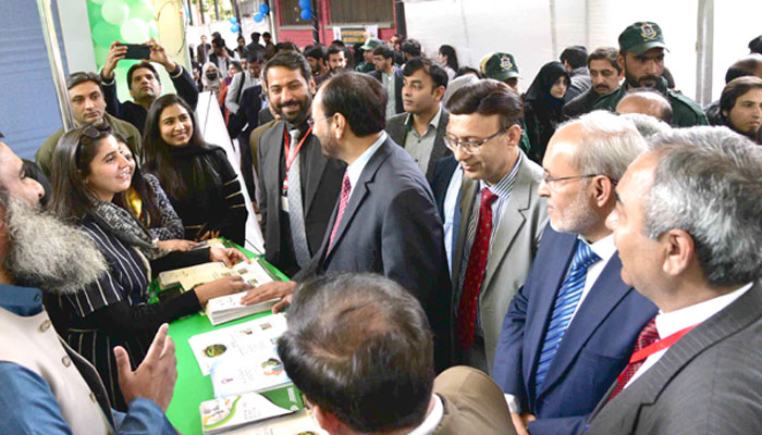 Chairman Punjab Higher Education Commission Prof Dr Shahid Munir and Punjab University vice chancellor Dr Khalid Mahmood visited stalls during the 9th Invention to Innovation Summit at the Punjab University. —  Punjab University