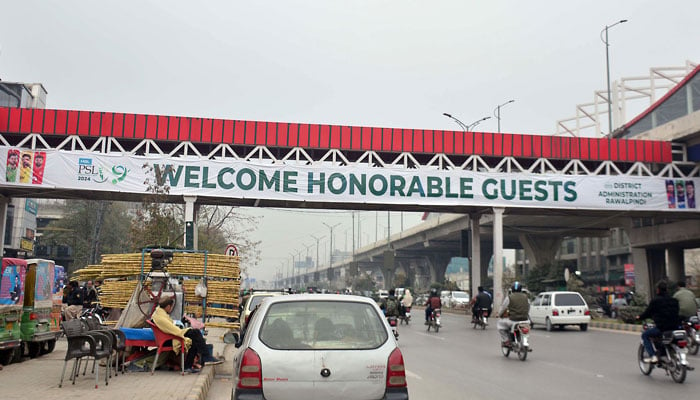 A view of banners of PSL fixed on metro bus station pedestrian bridge at Rehmanabad in Rawalpindi on February 29, 2024.— Online
