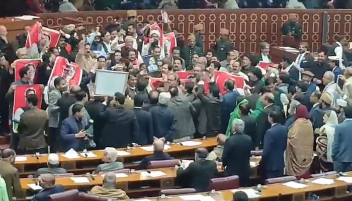 The screenshot shows PTI SIC members protesting at the floor of the National Assembly on Feb 29, 2024. — x/Shaharyarnaqvi2