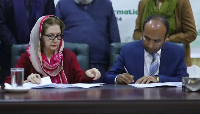 The screenshot from a video released on Feb 29, 2024 shows the signing of a Memorandum of Understanding (MoU) between the Khyber Pakhtunkhwa Information Commission (KPIC) and Transparency International-Pakistan (TIP). — Facebook/TransparencyInternational.Pakistan