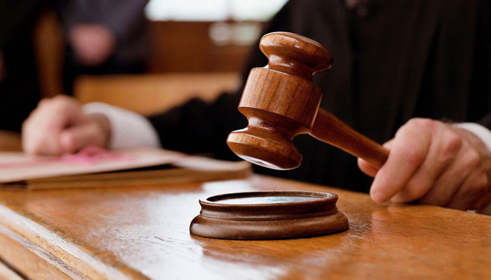 Representational image of a gavel held by a judge. — Unsplash