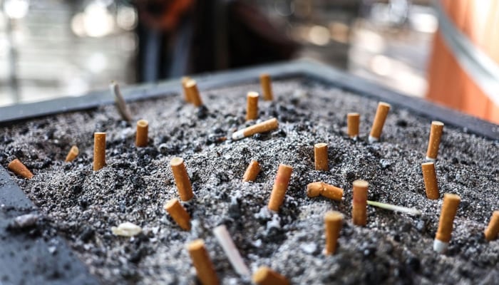 This representational image shows cigarettes and ashes. — AFP/File