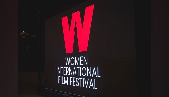 Women International Film Festival (WIFF) logo can be seen on screen during film festival. — APP/File