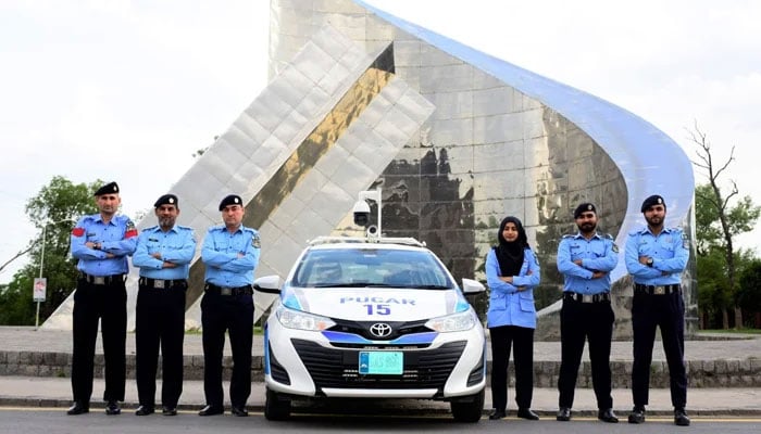 Islamabad Capital City Police Officers pose on the road of ICT on January 27, 2024. — Facebook/Islamabad Police