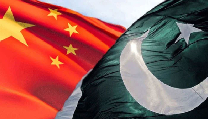 This image shows the flags of China (left) and Pakistan. — AFP