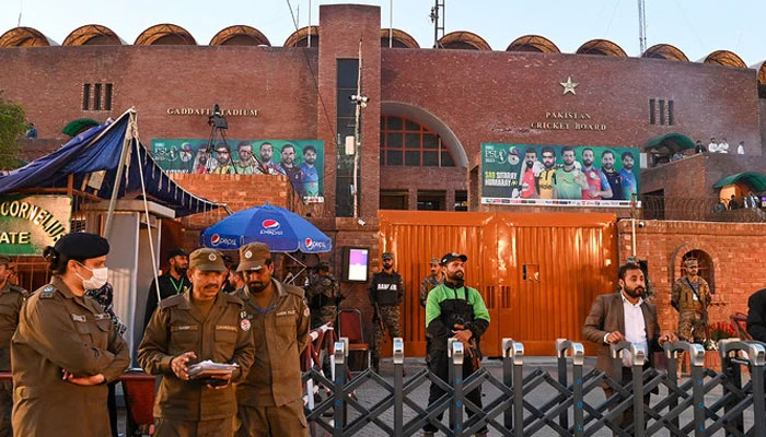 Policemen stand guard outside the Gaddafi Cricket Stadium during the Pakistan Super League (PSL) T20 cricket final match between Multan Sultans and Lahore Qalandars, in Lahore on March 18, 2023. — AFP