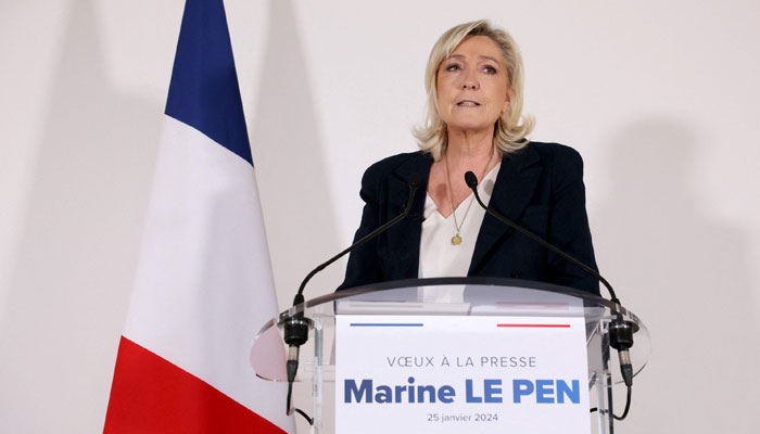 French far-right party Rassemblement National (RN) president Marine Le Pen addresses her New Year wishes to the press during a news conference in Paris on January 25, 2024. — AFP