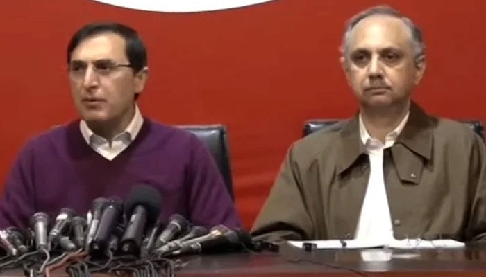 PTI leaders Barrister Gohar Ali Khan (left) and Omar Ayub Khan address the press conference in Islamabad on February 18, 2024, in this still taken from a video. — Geo News