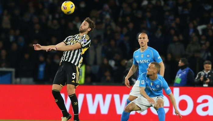 FC Juventus Italian midfielder Manuel Locatelli (left) controls the ball during the Italian Serie A football match against SSC Napoli at the Diego-Armando-Maradona stadium in Naples, on March 3 2024. — AFP