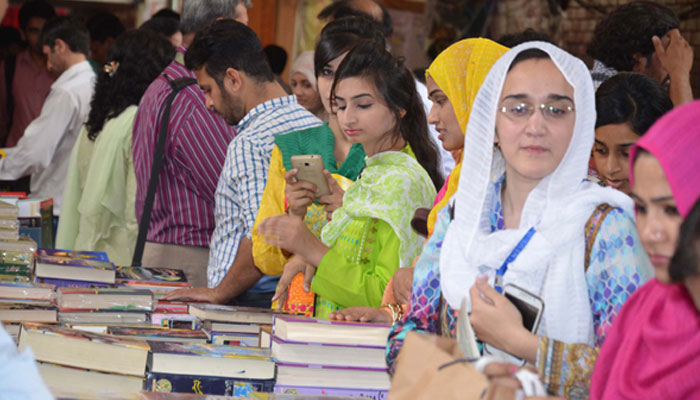 Students visit book stall at Pakistans largest annual book fair organized by PU administration. — PU Website/File