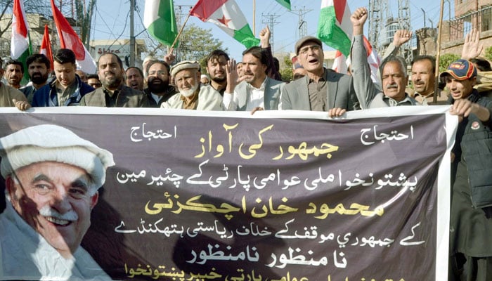 Activists of Pashtunkhwa Milli Awami Party (PKMAP) holds protest rally against the raid on the house of Mahmood Khan Achakzai, Chairman of the PKMAP, at Peshawar press club on March 5, 2024. — PPI
