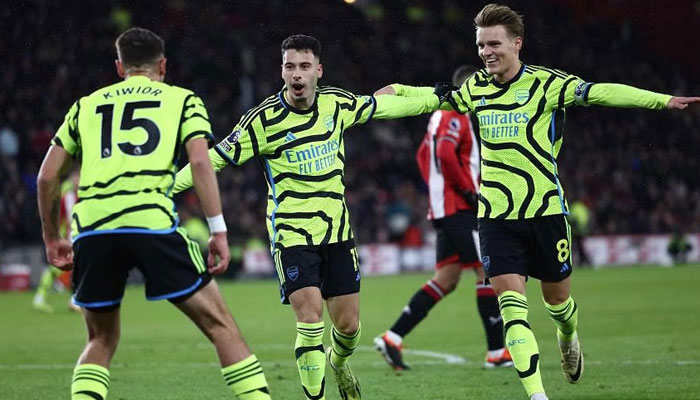 Arsenals Gabriel Martinelli (centre) celebrating with his teammates after scoring the teams third goal against Sheffield United. — AFP/File