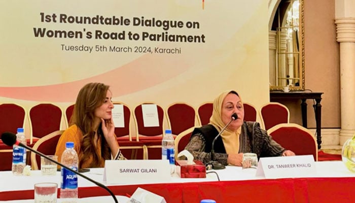 A speaker Dr. Tanveer Khalid speaks to a roundtable consultative dialogue titled ‘Women’s Road to Parliament’ at a hotel in Karachi on March 5, 2024. — Facebook/Fauzia Kehar