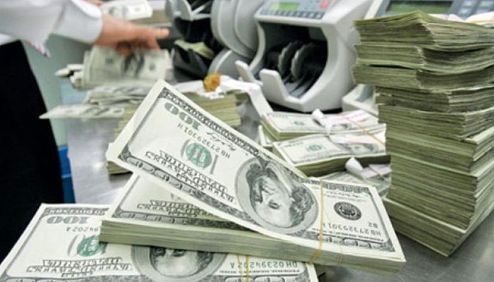 This image shows stacks US dollars. — AFP/File